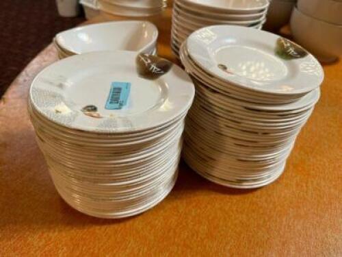 DESCRIPTION: (48) 9" PLASTIC BUFFET PLATES. LOCATION: MAIN SEATING THIS LOT IS: ONE MONEY QTY: 1