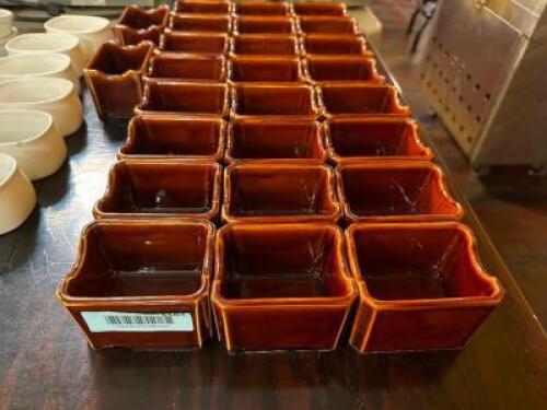 DESCRIPTION: (26) CERAMIC SUGAR CADDYS LOCATION: MAIN SEATING THIS LOT IS: SOLD BY THE PIECE QTY: 26