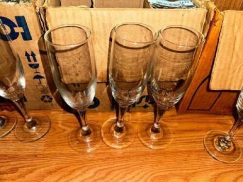 DESCRIPTION: (24) CHAMPAGNE FLUTES LOCATION: MAIN SEATING THIS LOT IS: SOLD BY THE PIECE QTY: 24