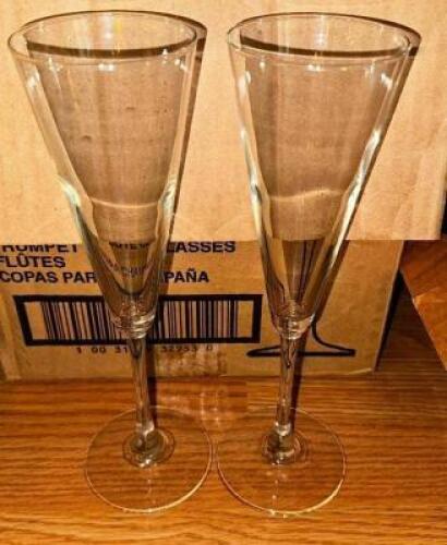 DESCRIPTION: (12) TRUMPET FLUTE GLASSES LOCATION: MAIN SEATING THIS LOT IS: SOLD BY THE PIECE QTY: 12