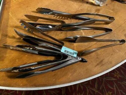 DESCRIPTION: (8) ASSORTED STAINLESS TONGS LOCATION: MAIN SEATING THIS LOT IS: ONE MONEY QTY: 1
