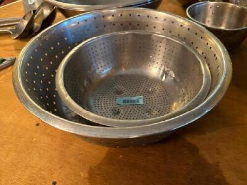 DESCRIPTION: (2) STAINLESS STRAINERS LOCATION: MAIN SEATING THIS LOT IS: ONE MONEY QTY: 1