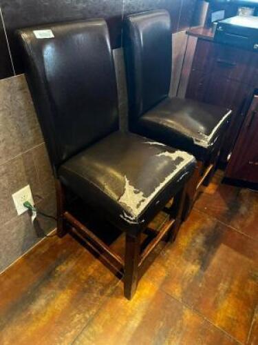 DESCRIPTION: (2) COUNTER HEIGHT PLEATHER CHAIRS LOCATION: ENTRANCE THIS LOT IS: SOLD BY THE PIECE QTY: 2