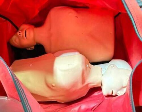 CPR DUMMIES AS SHOWN WITH CARRYING BAG