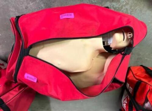 CPR DUMMIES AS SHOWN WITH CARRYING BAG