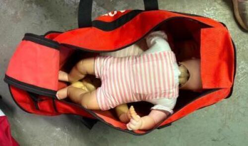 CPR DUMMIES AS SHOWN WITH CARRYING BAG