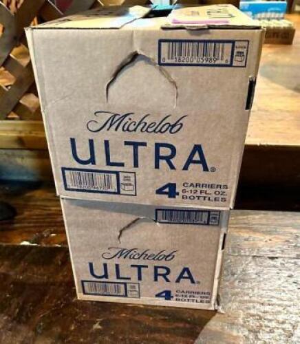 DESCRIPTION: (2) FULL CASE OF MICH ULTRA INFORMATION: 51 TOTAL BOTTLES LOCATION: MAIN DINING QTY: 2