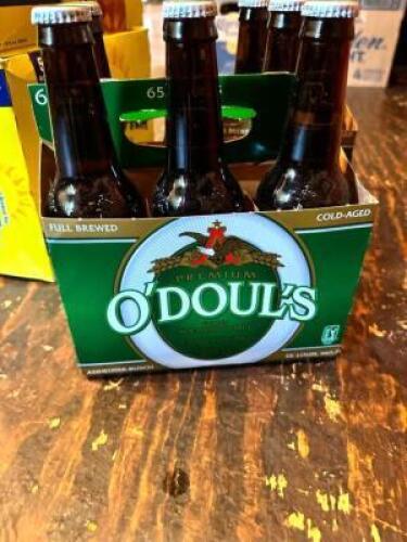 DESCRIPTION: (2) SIX PACKS OF O'DOUL'S INFORMATION: 12 BOTTLES TOTAL LOCATION: MAIN DINING QTY: 2