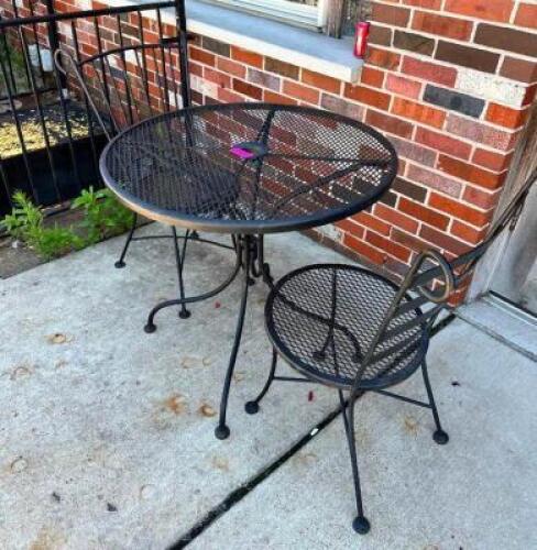 DESCRIPTION: WROUGHT IRON BISTRO TABLE W/ 2 CHAIRS SIZE: 30.5" LOCATION: FRONT PATIO QTY: 1
