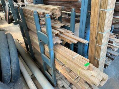 WOOD RACK WITH ASSORTED BASEBOARD AND CONTENTS