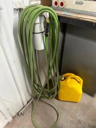 GARDEN HOSE AND FUEL CAN.