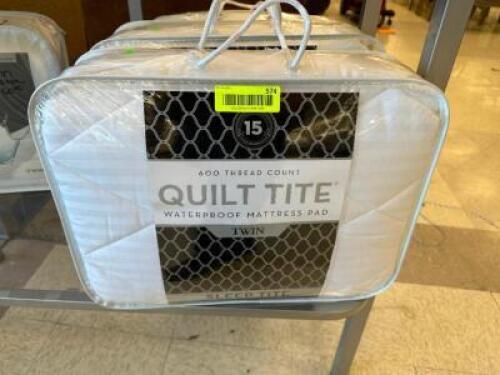 (2) QUILT TITE TWIN MATTRESS PADS