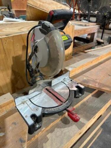 DESCRIPTION: CRAFTSMAN 10" COMPOUND MITER SAW W/ LASER TRAC ADDITIONAL INFORMATION W/ LEFT AND RIGHT WOODEN FEEDER STANDS LOCATION: WAREHOUSE QTY: 1