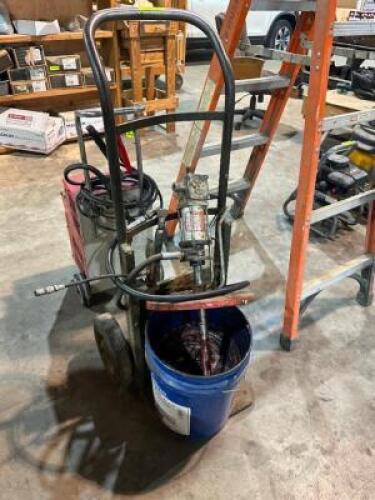 DESCRIPTION: HAND TRUCK W/ PORTABLE GREASER LOCATION: WAREHOUSE QTY: 1