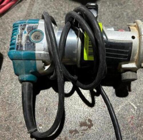 DESCRIPTION: MAKITA ELECTRIC ROUTER LOCATION: WAREHOUSE QTY: 1