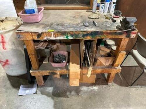 DESCRIPTION: 48" WOODEN FABRICATION TABLE W/ 4" MOUNTED VICE LOCATION: WAREHOUSE QTY: 1