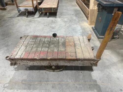 DESCRIPTION: 60" WOODEN WAREHOUSE CART ADDITIONAL INFORMATION W/ HEAVY DUTY CAST IRON WHEELS LOCATION: WAREHOUSE QTY: 1