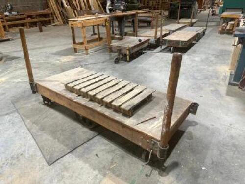 DESCRIPTION: 72" WOODEN WAREHOUSE CART ADDITIONAL INFORMATION W/ HEAVY DUTY CAST IRON WHEELS LOCATION: WAREHOUSE QTY: 1