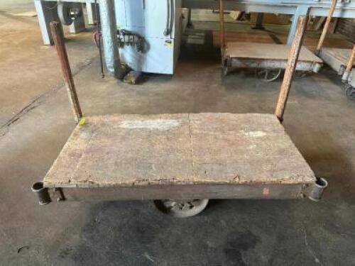 DESCRIPTION: 60" WOODEN WAREHOUSE CART ADDITIONAL INFORMATION W/ HEAVY DUTY CAST IRON WHEELS LOCATION: WAREHOUSE QTY: 1