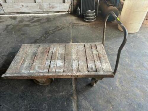 DESCRIPTION: 60" WOODEN WAREHOUSE CART ADDITIONAL INFORMATION W/ HEAVY DUTY CAST IRON WHEELS LOCATION: WAREHOUSE QTY: 1