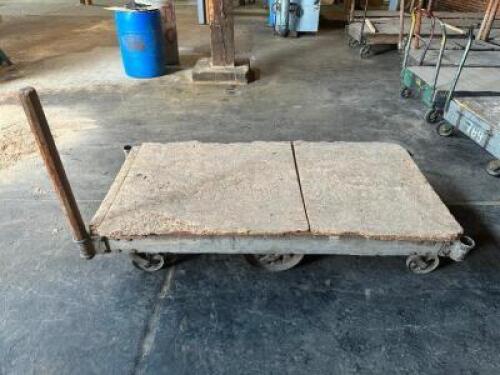 DESCRIPTION: 72" WOODEN WAREHOUSE CART ADDITIONAL INFORMATION W/ HEAVY DUTY CAST IRON WHEELS LOCATION: WAREHOUSE QTY: 1