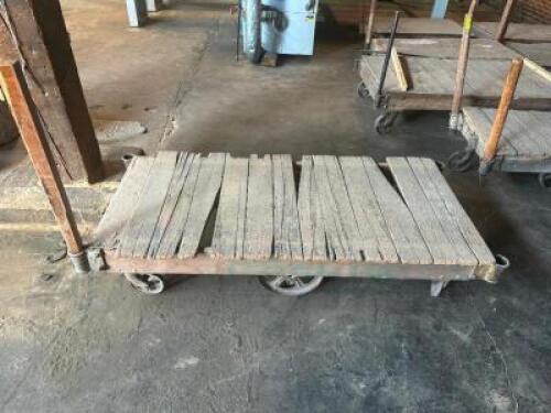 DESCRIPTION: 72" WOODEN WAREHOUSE CART ADDITIONAL INFORMATION W/ HEAVY DUTY CAST IRON WHEELS LOCATION: WAREHOUSE QTY: 1