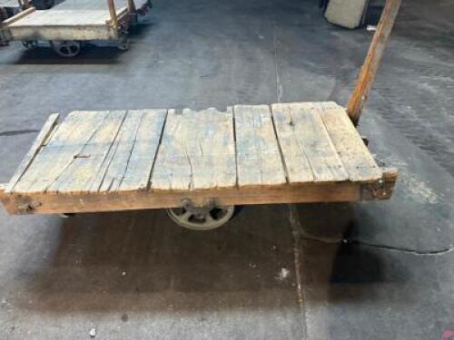 DESCRIPTION: 60" WOODEN WAREHOUSE CART ADDITIONAL INFORMATION W/ HEAVY DUTY CAST IRON WHEELS LOCATION: WAREHOUSE QTY: 1