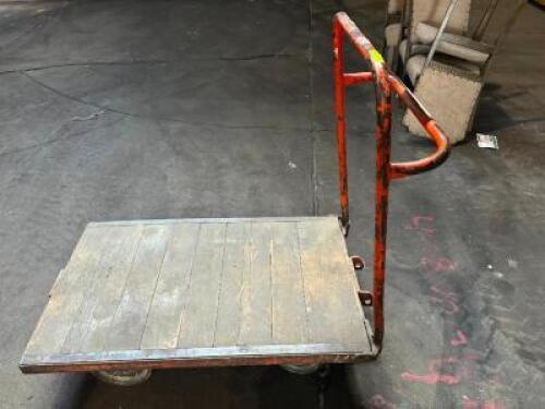 DESCRIPTION: 48" WOODEN WAREHOUSE CART ADDITIONAL INFORMATION W/ HEAVY DUTY CAST IRON WHEELS LOCATION: WAREHOUSE QTY: 1