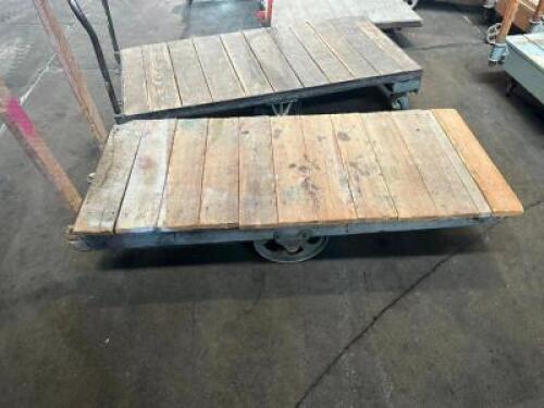 DESCRIPTION: 72" WOODEN WAREHOUSE CART ADDITIONAL INFORMATION W/ HEAVY DUTY CAST IRON WHEELS LOCATION: WAREHOUSE QTY: 1
