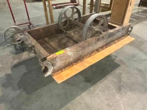 DESCRIPTION: (2) 48" VINTAGE WAREHOUSE CARTS ADDITIONAL INFORMATION W/ HEAVY DUTY CAST IRON WHEELS LOCATION: WAREHOUSE THIS LOT IS: SOLD BY THE PIECE