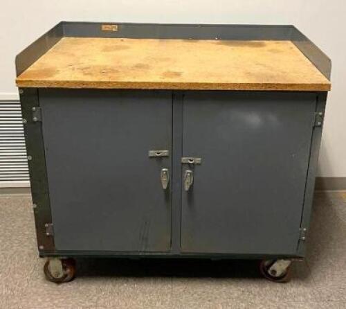 DESCRIPTION 42" X 24" X 38" MOBILE STORAGE CART WITH WOODEN TOP LOCATION BASEMENT SERVER ROOM QUANTITY 1
