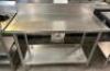 48" X 22" STAINLESS TABLE W/ 6" BACK SPLASH
