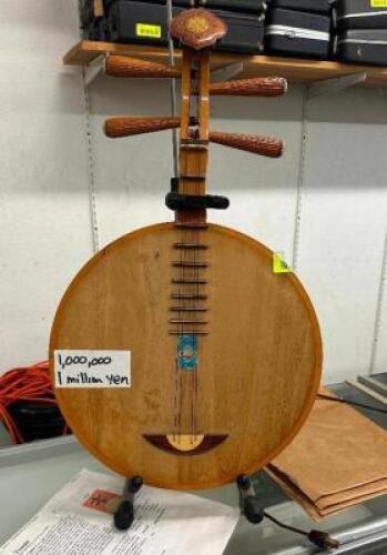 ANTIQUE YUEQIN MOON GUITAR WITH STAND AND INFO SHEET
