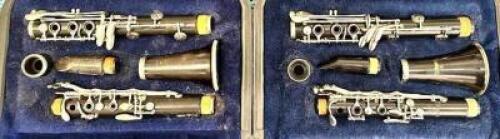 (1)- PLASTIC CLARINET & (1)- WOOD CLARINET