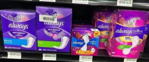 (18) ASSORTED PACKS OF FEMININE HYGIENE PRODUCTS.