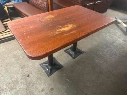 (2) 48" X 30" HARDWOOD BOOTH TABLES W/(2) METAL PEDESTAL BASES.