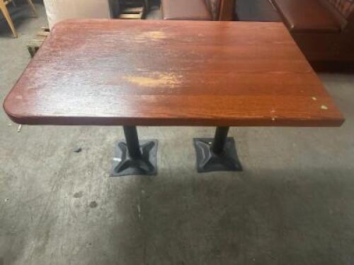 (2) 48" X 30" HARDWOOD BOOTH TABLES W/(2) METAL PEDESTAL BASES.