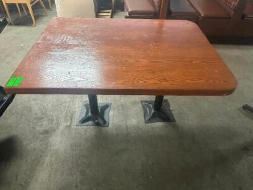 (2) 48" X 36" HARDWOOD BOOTH TABLES W/(2) METAL PEDESTAL BASES.