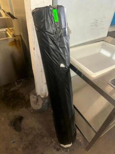 60" ROLL OF BLACK PLASTIC TABLE COVERINGS.