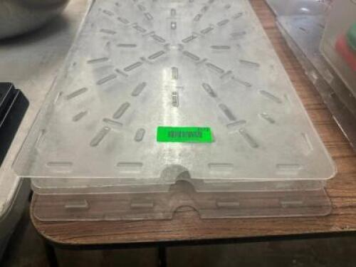 (4) FULL SIZE SLOTTED PLASTIC DRAIN PANS INSERTS.