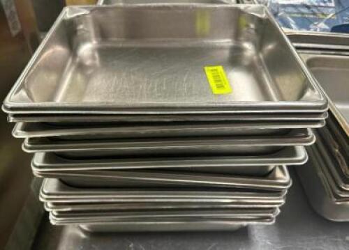 (8) HALF SIZE STAINLESS INSERTS.