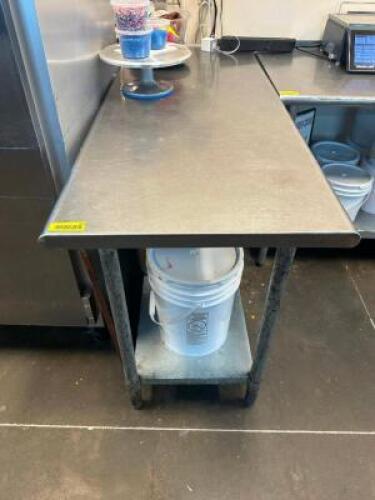 60" X 24" STAINLESS TABLE.