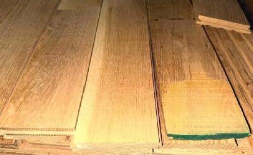 APPROX 60 48" ROWS OF 4" AND 5" UNFINISHED RIFT QUARTER SAWN WHITE OAK FLOORING IN ASSORTED LENGTHS.