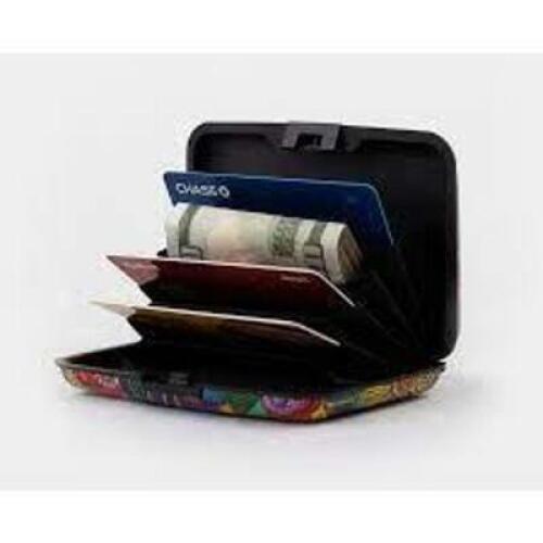 DESCRIPTION: (1) BOX OF APPROX (30) ARMOURED METAL WALLETS INFORMATION: MANY COLORS RETAIL$: $10.00 PER WALLET QTY: 1