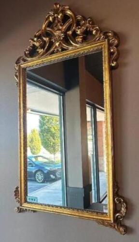 WALL MIRROR W/ ORNATE FRAME.