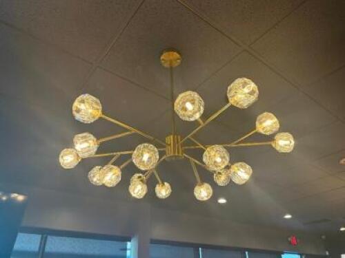 SEVENTEEN GROUP CHANDELIER LIGHT FIXTURE. GOLD FINISH W/ CRYSTAL STYLE SHADES.