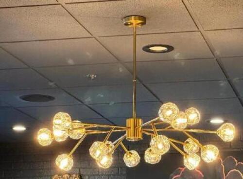 SEVENTEEN GROUP CHANDELIER LIGHT FIXTURE. GOLD FINISH W/ CRYSTAL STYLE SHADES.