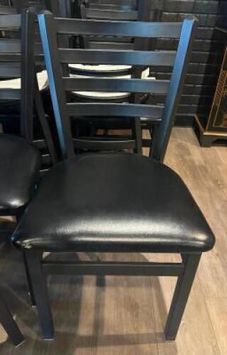 (11) LADDER BACK METAL CHAIRS W/ BLACK PADDED SEATS.