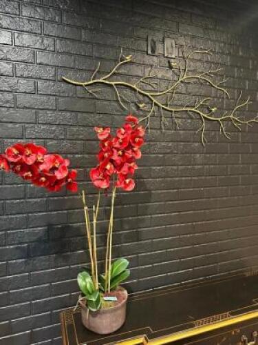 FAUX FLOWER ARRANGEMENTS AND BRANCH WALL ACCENT PIECE.