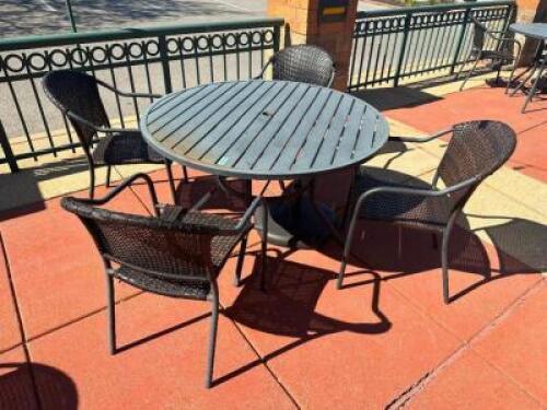48" ROUND PATIO TABLE W/ (4) METAL AND WICKER CHAIRS.
